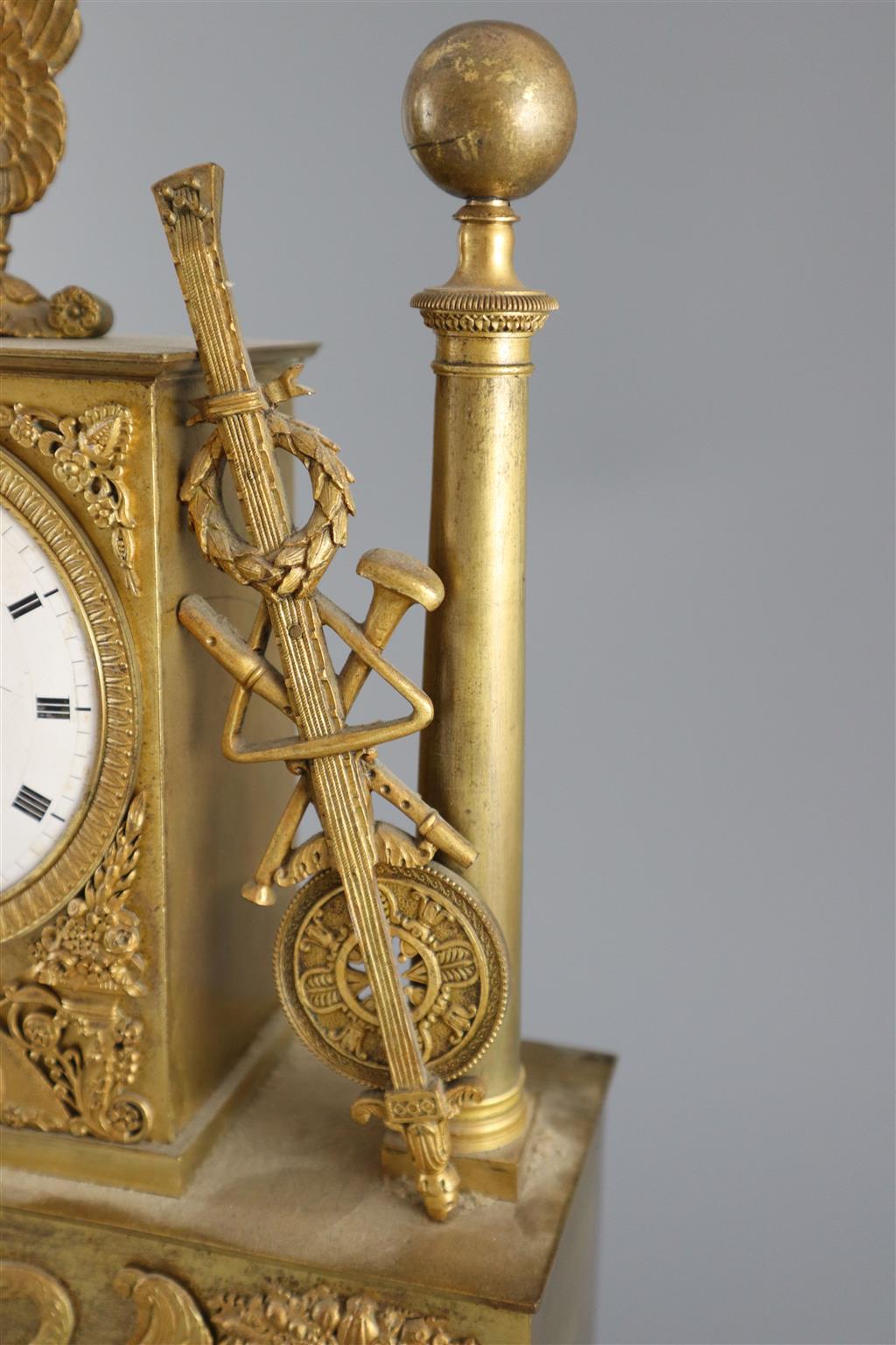 A 19th Century French Empire style ormolu mantel clock, height 15in.